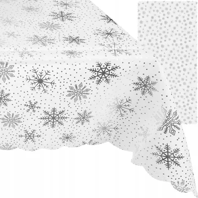 A white tablecloth with a snowflake pattern.