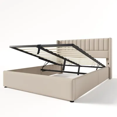A beige upholstered bed frame with the mattress support system lifted to reveal the storage compartment underneath.