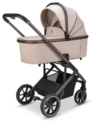 A studio shot of a beige and brown baby stroller against a white background.