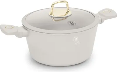 A white pot with a glass lid and gold accents, shown from a slightly elevated side angle on a white background.