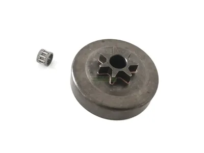 A metal sprocket and a small roller bearing are shown on a white background.