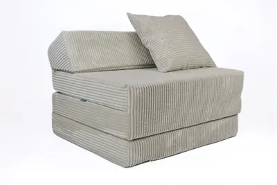A folded mattress with a headrest and a pillow, shown against a white background.