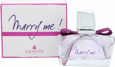 A perfume bottle and its box are displayed side-by-side against a white background.