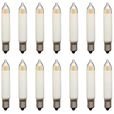 A collection of LED filament candle bulbs arranged in two rows against a white background.
