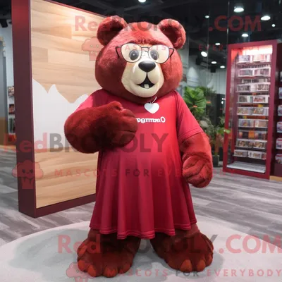 Produktbild von Maskottchenfigur REDBROKOLY eines kastanienbraunen Bären mit Maxikleid und Brille