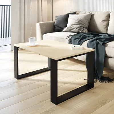 A modern living room scene with a couch and coffee table.