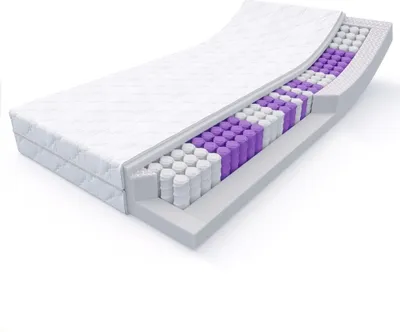 A cutaway view of a mattress showing its internal structure, including pocket springs and foam layers.