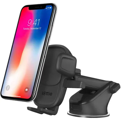 A smartphone mounted on a car mount.