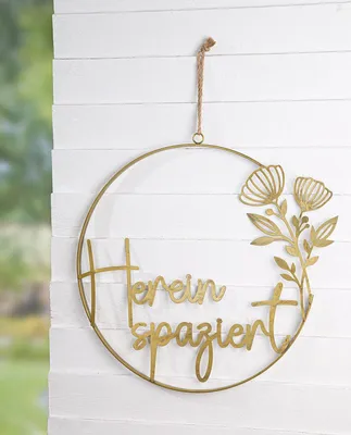 Imagen del producto de Letrero decorativo circular, con la inscripción "Adelante", hecho de metal dorado. Vendo en paquetes de 2 unidades. Dimensiones: largo 2 cm, ancho 59 cm, alto 75 cm. Código: 69872