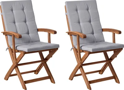 Produktbild von BELIANI Gartenstuhl 2er Set Hellbraun Akazienholz Klappbar mit Auflagen Hellgrau Hohe Armlehnen Modern Garten Balkon Klappstuhl Niedriglehner Stuhl