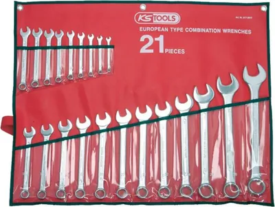 A set of combination wrenches laid out in a red roll-up pouch.