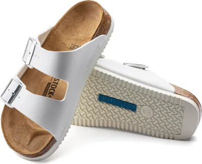 A pair of white Birkenstock sandals shown on a white background.