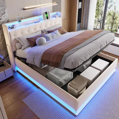 A modern bedroom with a bed featuring LED lighting and open storage compartments.