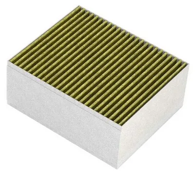 A close-up, angled view of a car cabin air filter.