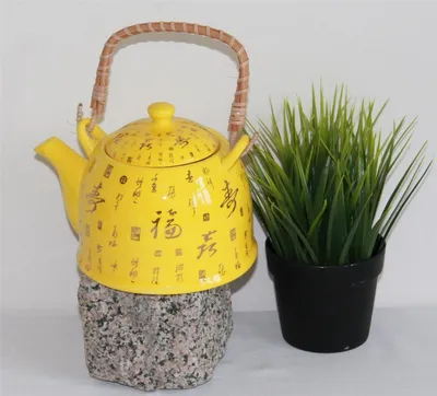Produktbild von Teekanne gelb mit Teesieb, ca. 0,75 Liter, Höhe 12 cm, Durchmesser 14 cm