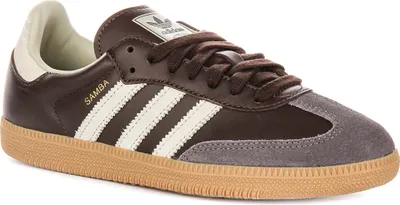 A studio shot of a single Adidas Samba OG W sneaker.