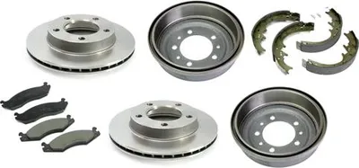 Zdjęcie produktu dla Tarcze hamulcowe + klocki przód / bębny hamulcowe + szczęki tył Jeep CJ 82-86