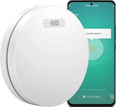 A white smart smoke detector is shown next to a smartphone displaying a notification.