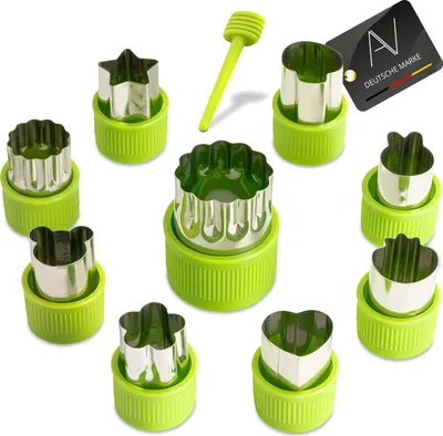 A collection of stainless steel vegetable and fruit cutters with green plastic bases and a green handle tool, arranged on a white background.