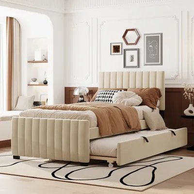 A bedroom scene featuring a beige upholstered bed with a pull-out trundle bed.
