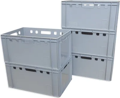 A stack of grey plastic storage crates.