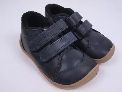 A pair of dark blue children's winter boots with velcro straps and a brown sole, shown against a white background.