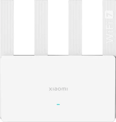 A white Xiaomi router with four antennas.