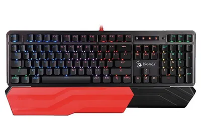 A black and red gaming keyboard with a detachable wrist rest, shown from a front-facing perspective against a white background.