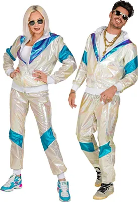A man and a woman posing in matching holographic tracksuits.
