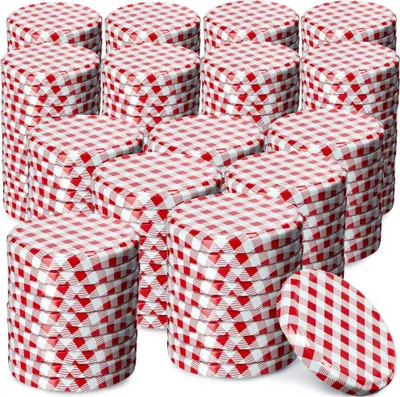 A stack of red and white checkered jar lids.