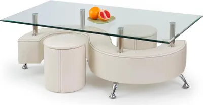 A modern coffee table with a glass top and a curved white base, featuring two round ottomans integrated into the base. Two grapefruits are placed on the table.