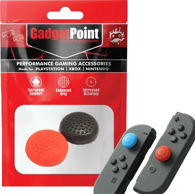 A product package for gaming accessories is shown next to two Nintendo Switch Joy-Con controllers with thumb grips attached.
