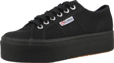 A studio shot of a black platform sneaker.
