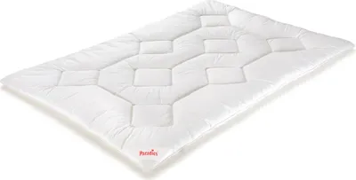 A white comforter or duvet is shown from a diagonal angle against a white background.