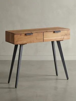 Moderner Konsolentisch aus massivem Akazienholz mit schwarzen Metallbeinen und zwei Schubladen, freigestellt auf weißem Hintergrund._#sku_BARWL6.155#