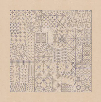A flat lay of a Sashiko embroidery pattern on a beige background.