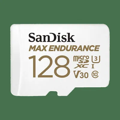 A white microSD card with gold text and markings, set against a green background.