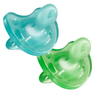 Two pacifiers, one teal and one green, are shown against a white background.