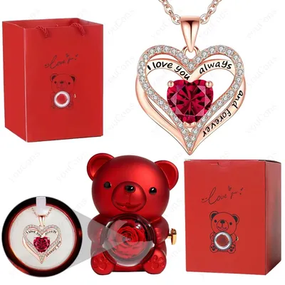 Imagen del producto de Un collar rojo con forma de corazón, un osito y una rosa: un regalo para mujeres