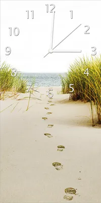 Produktbild von Wallario Design Wanduhr Spuren im Sand- Fußspuren durch die Düne zum Meer aus Echtglas, Größe 30 x 60 cm
