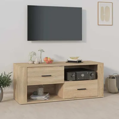 A TV stand with a TV mounted above it, in a room setting.