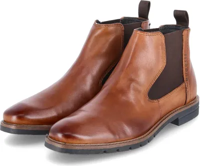 A pair of brown leather Chelsea boots on a white background.