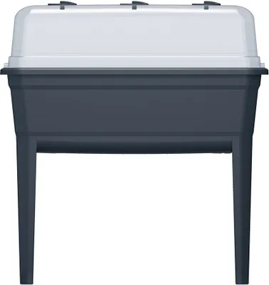 A front view of a dark grey plastic steamer on legs with a clear lid.