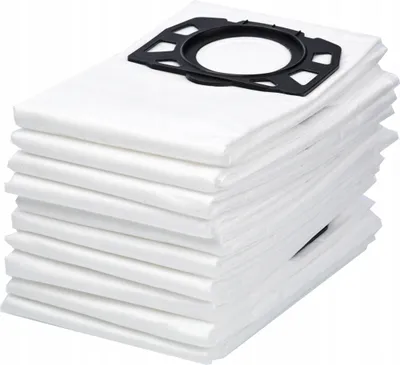 A stack of white vacuum cleaner bags with a black plastic adapter on top, set against a white background.