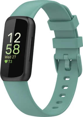 A Fitbit Inspire 3 fitness tracker with a green silicone band is shown against a white background.