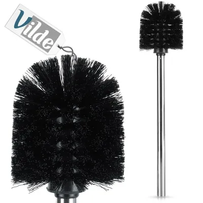 A black toilet brush with a silver handle is shown against a white background. A close-up of the brush head is on the left, and a full view of the brush is on the right. A tag with the brand name 'Vilde' is attached to the brush head on the left.