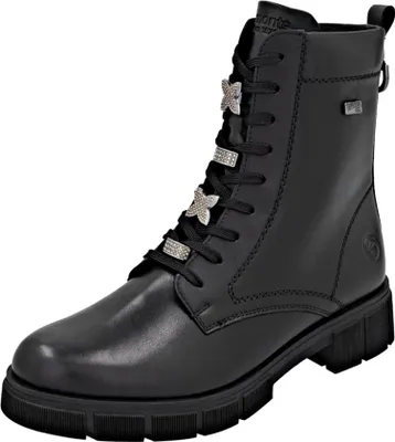 A black leather boot with laces and decorative butterfly charms.