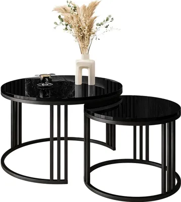 A set of two nesting coffee tables with black glossy tops and black metal frames.