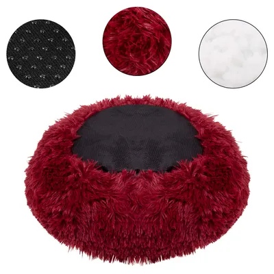 A round, plush dog bed with a black mesh center and a burgundy, long-haired exterior. Three circular insets show close-ups of the anti-slip bottom, the plush material, and the filling.