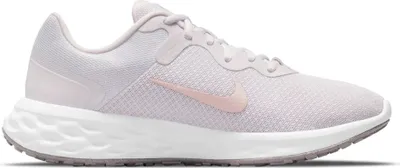 A side view of a single Nike women's running shoe.